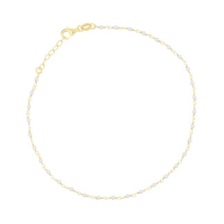 Stelle nilkkakoru valkoisilla helmillä